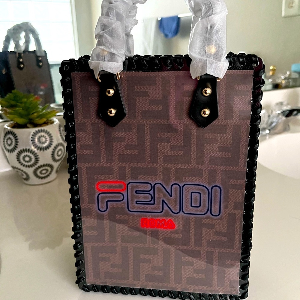 Recycled Fendi shopping bag into a purse